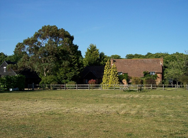 Surrounded by fierlds and forest
